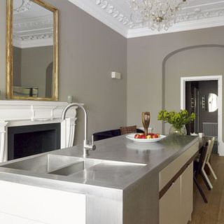 kitchen room with sink and mirror on wall