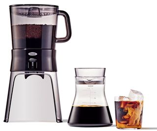 OXO Good Grips Coffee Maker with a carafe and cup of coffee