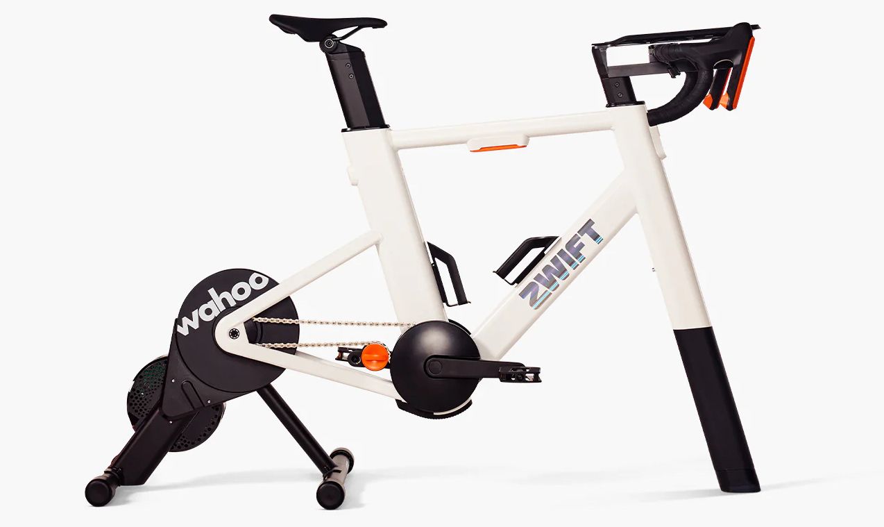 a zwift ride with kickr core turbo trainer bike sat on a white background