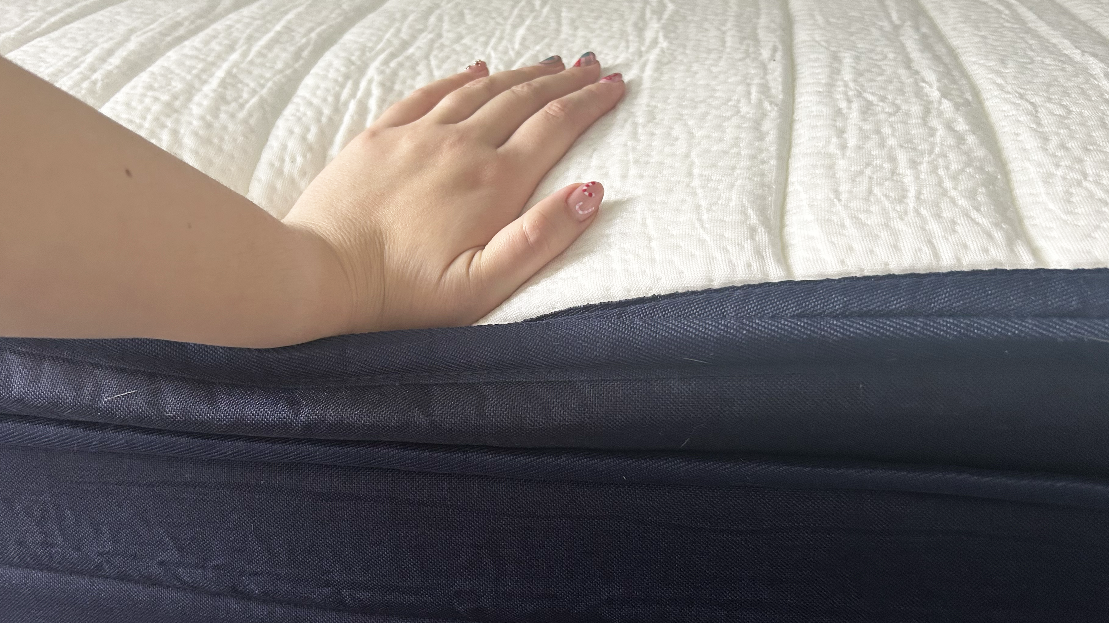 Origin Hybrid Plus with woman's hand