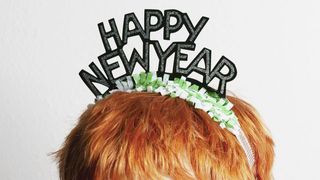 Happy New Year hairband on red hair