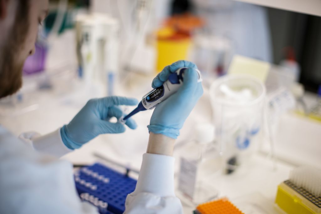 A researcher works on a vaccine against the new coronavirus COVID-19 at the Copenhagen&amp;#039;s University research lab in Copenhagen, Denmark, on March 23, 2020.