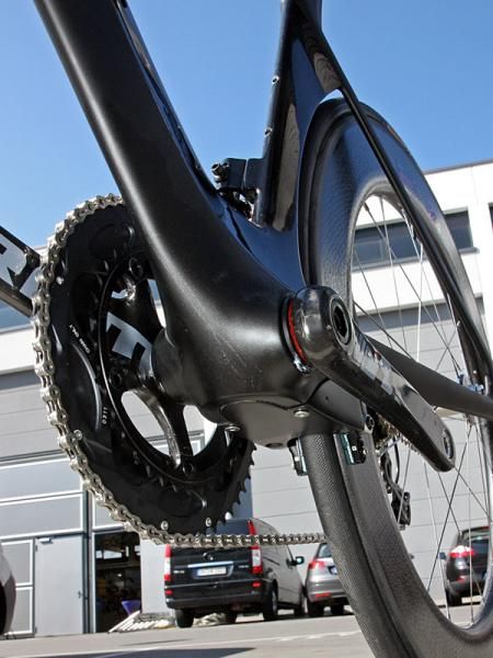 The bottom bracket features press-fit bearing cups.