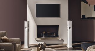 KEF LS60 Wireless in a living room either side of a fireplace