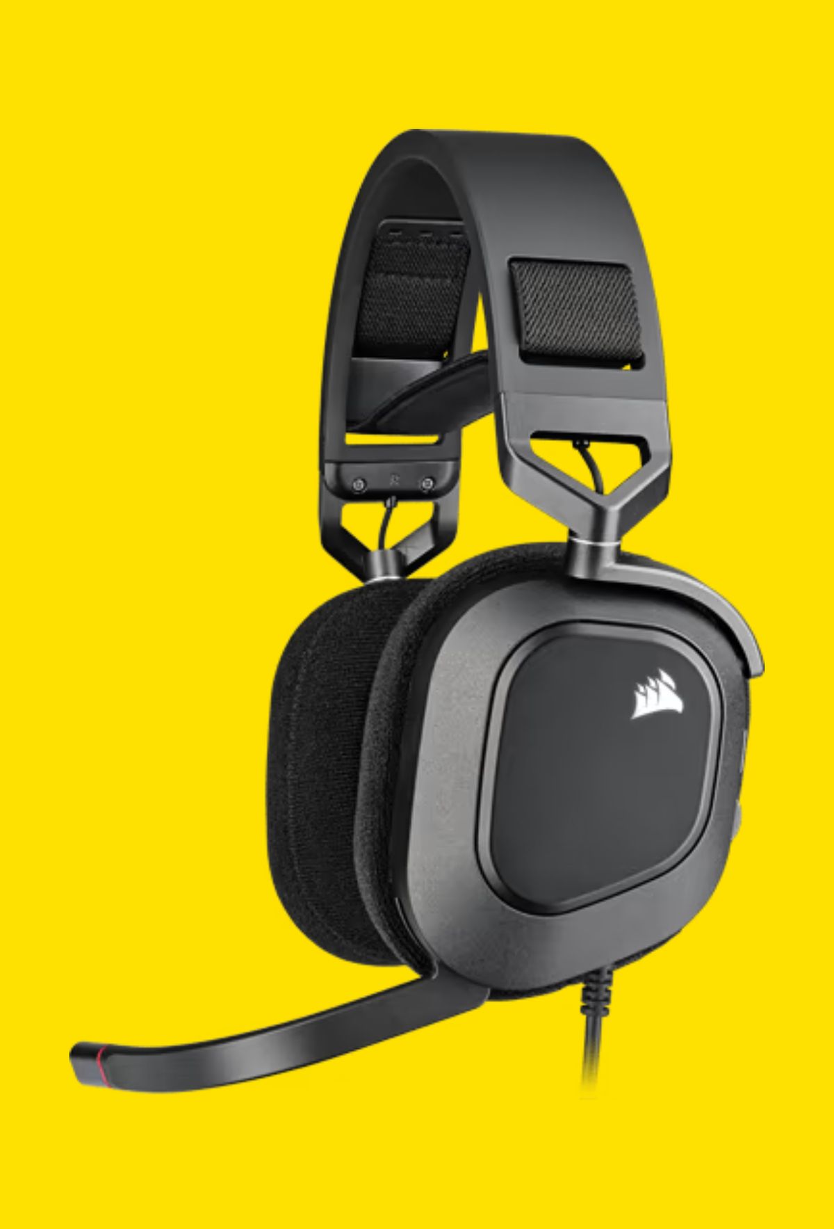 The Corsair HS80 RGB wireless gaming headset on a yellow background