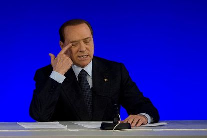 Berlusconi acquitted in sex-for-hire case