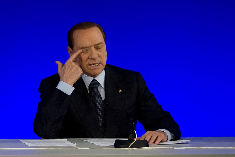 Berlusconi acquitted in sex-for-hire case