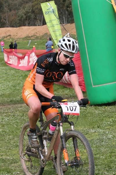 Jenni King rides in for third.
