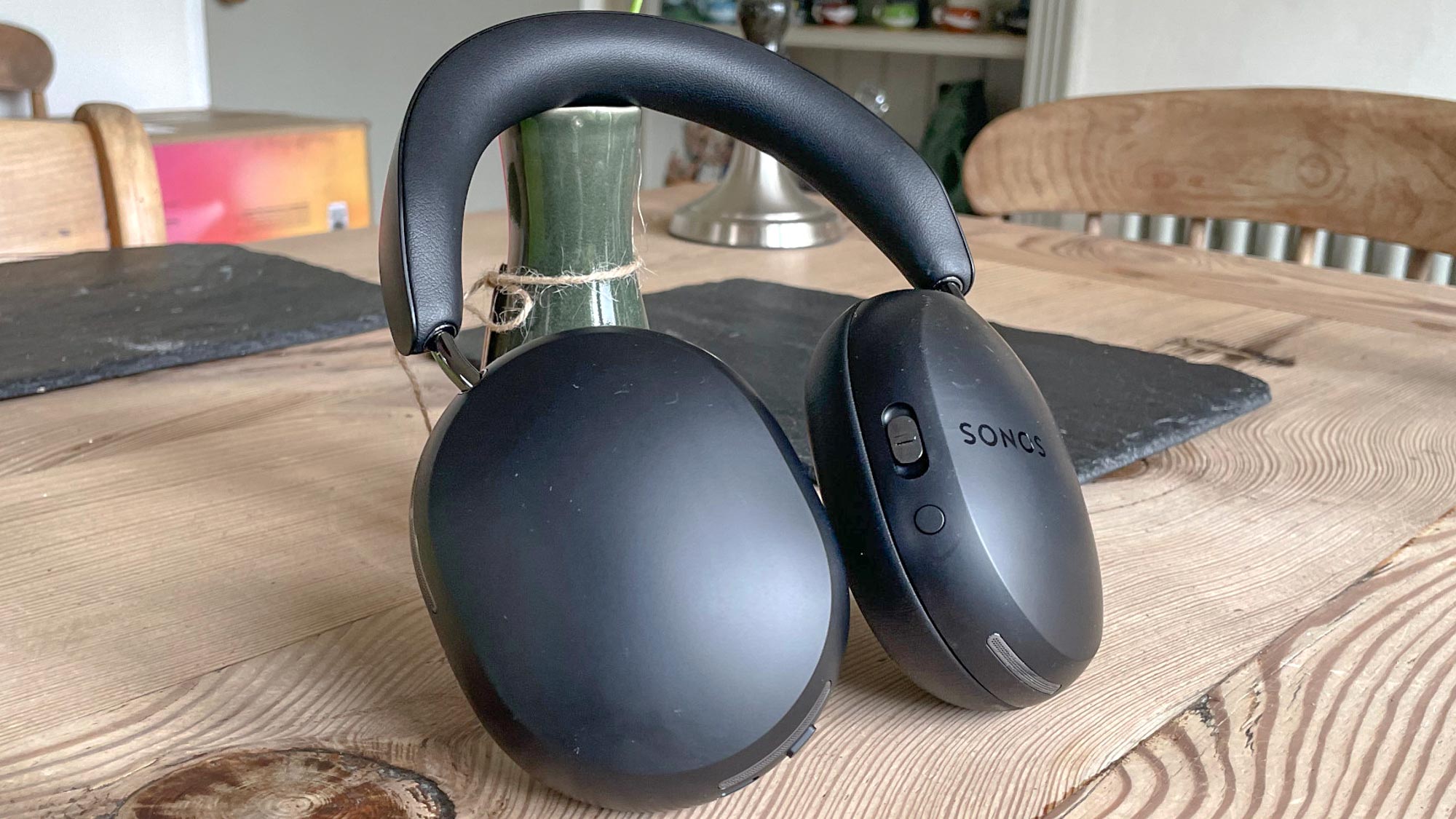 Sonos Ace headphones review image in black on a kitchen table