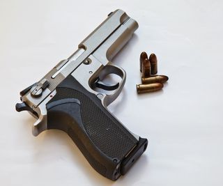 Semi-automatic handgun and ammo.