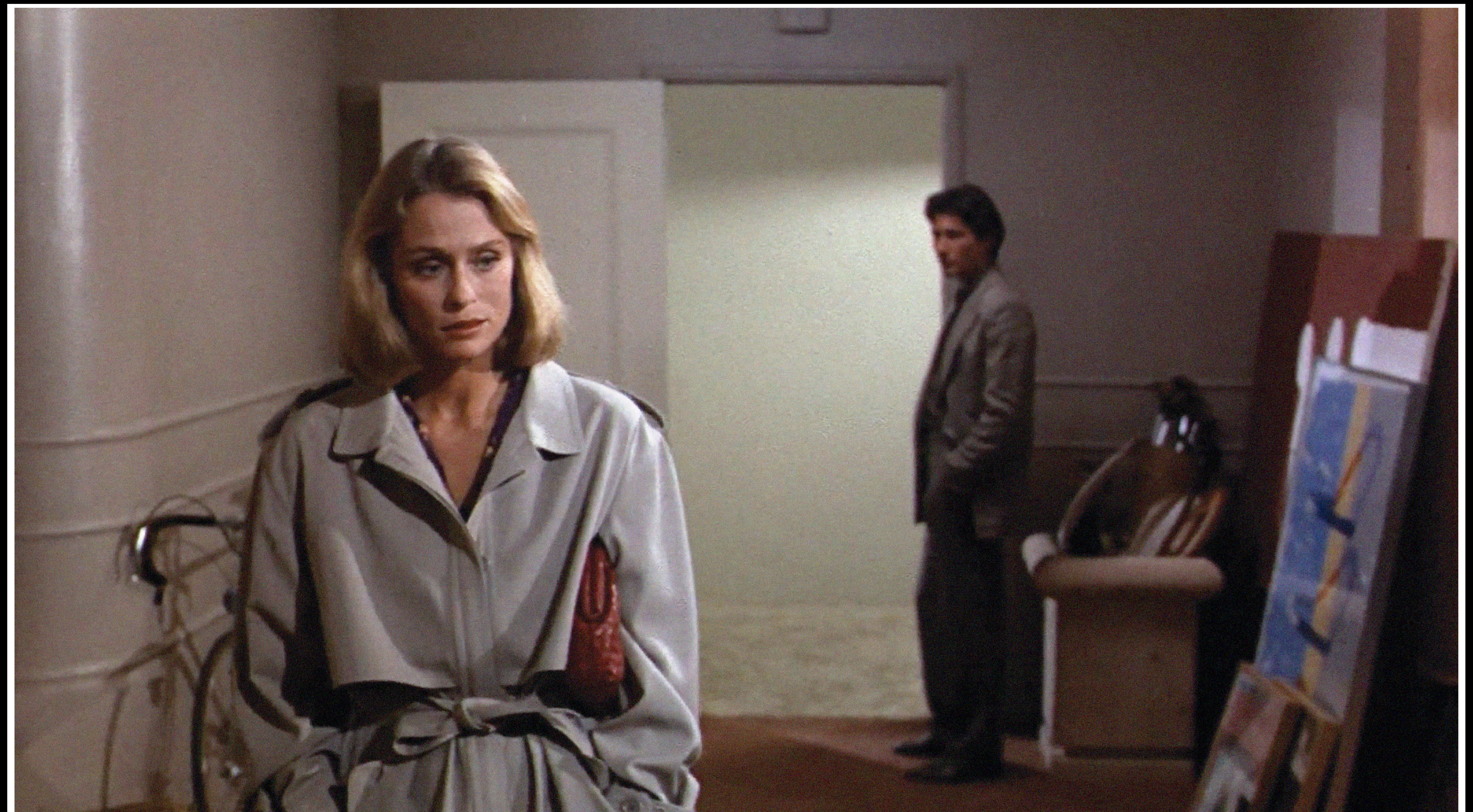 Lauren Hutton in American Gigolo carrying a burgundy Bottega Veneta Lauren Clutch.