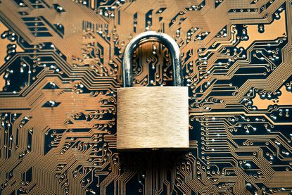 A padlock against a golden background to represent cyber security
