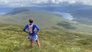 Runner overlooking South Glen Shiel Ridge