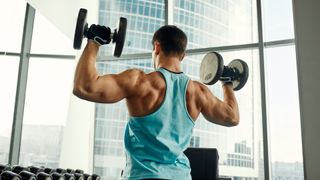 Man lifting dumbbells