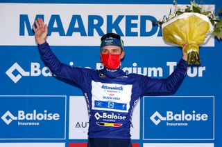 MAARKEDAL BELGIUM JUNE 09 Remco Evenepoel of Belgium and Team Deceuninck QuickStep Blue leader jersey celebrates at podium during the 90th Baloise Belgium Tour 2021 Stage 1 a 1753km stage from Beveren to Maarkedal Mask Covid safety measures baloisebelgiumtour on June 09 2021 in Maarkedal Belgium Photo by Bas CzerwinskiGetty Images