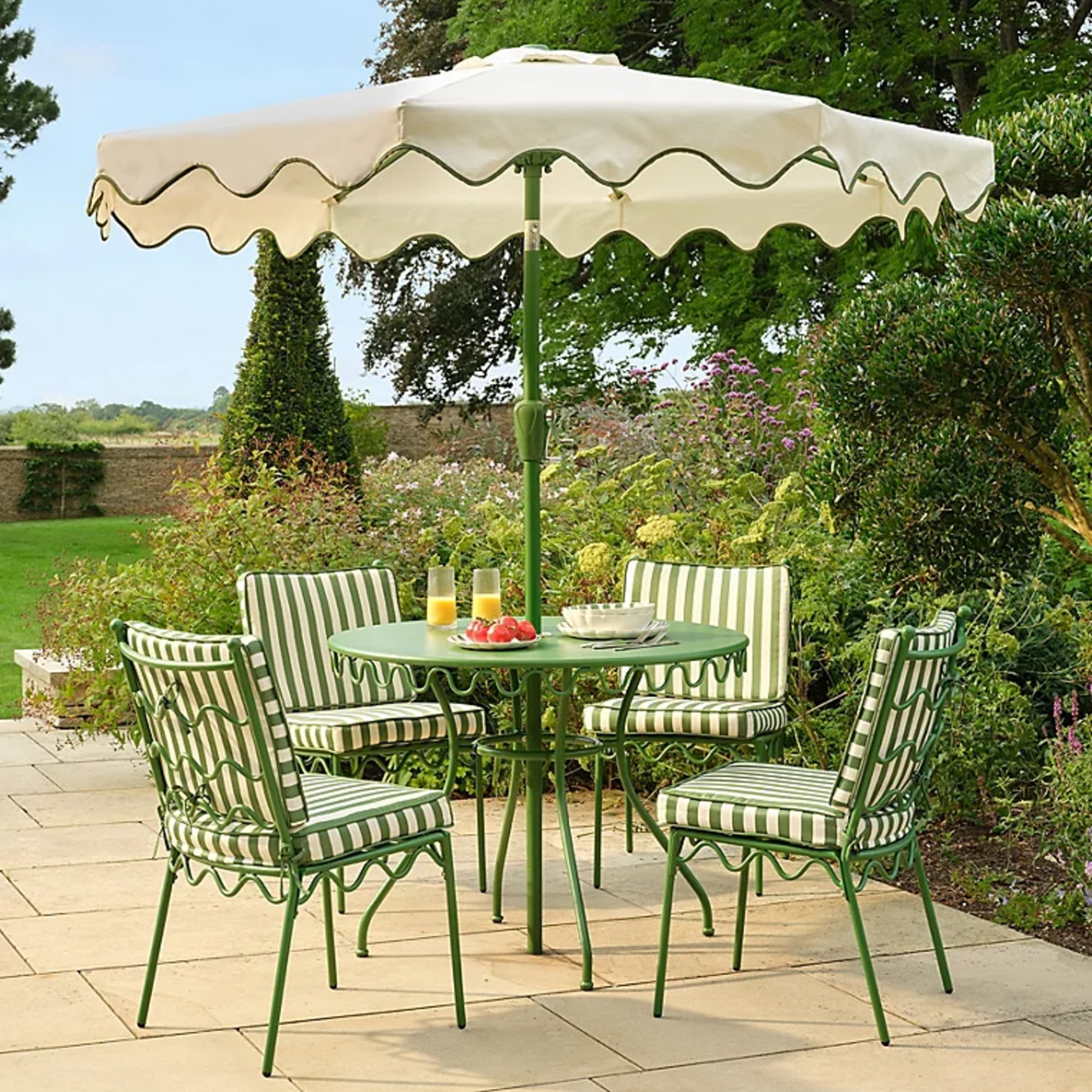 George Home Riviera Green and White Stripe 6 Piece Patio Set in a garden