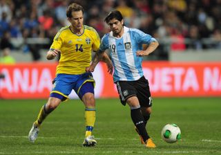 Ever Banega (right) in action for Argentina in a friendly against Sweden in February 2013.