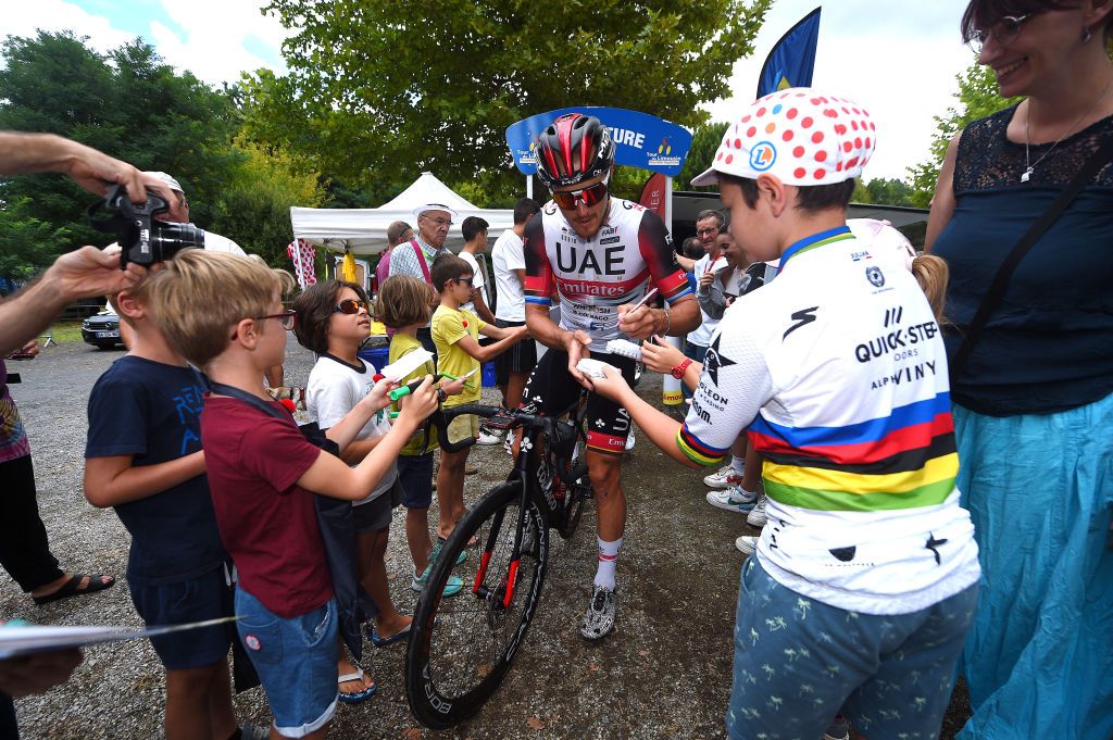 LIMOGES FRANCE AUGUST 18 Matteo Trentin of Italy and UAE Team Emirates meets the fans at start during the 55th Tour du Limousin Nouvelle Aquitaine 2022 Stage 3 a 1817km stage from Donzenac to Malemort TDL2022 on August 18 2022 in Limoges France Photo by Dario BelingheriGetty Images