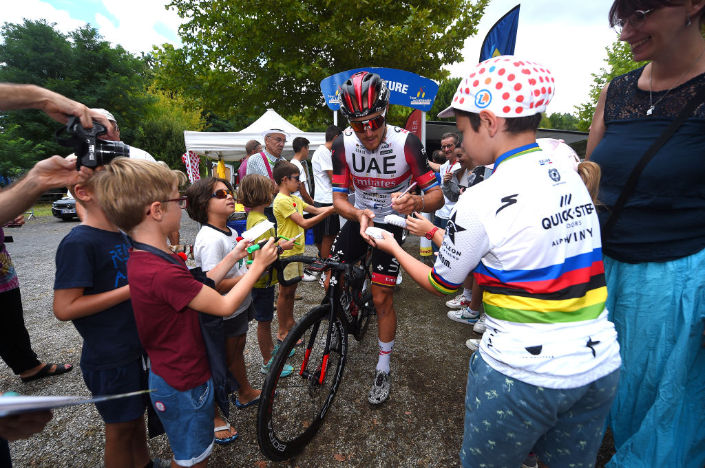 LIMOGES FRANCE AUGUST 18 Matteo Trentin of Italy and UAE Team Emirates meets the fans at start during the 55th Tour du Limousin Nouvelle Aquitaine 2022 Stage 3 a 1817km stage from Donzenac to Malemort TDL2022 on August 18 2022 in Limoges France Photo by Dario BelingheriGetty Images