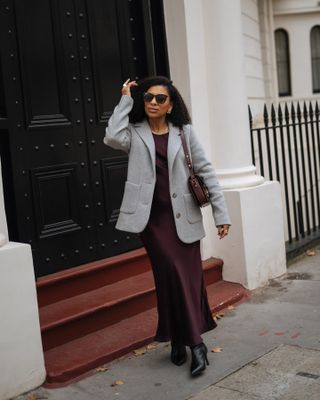 Best winter fashion trends for petites: @eleanorbarkes wears a blazer and slip dress