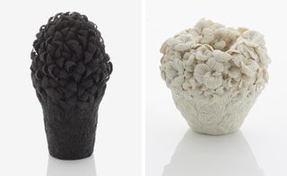 Black and cream intricately carved ceramic art pieces