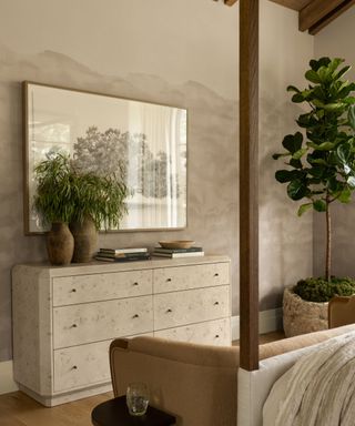 Mural wallpaper with dresser, large picture and green plants