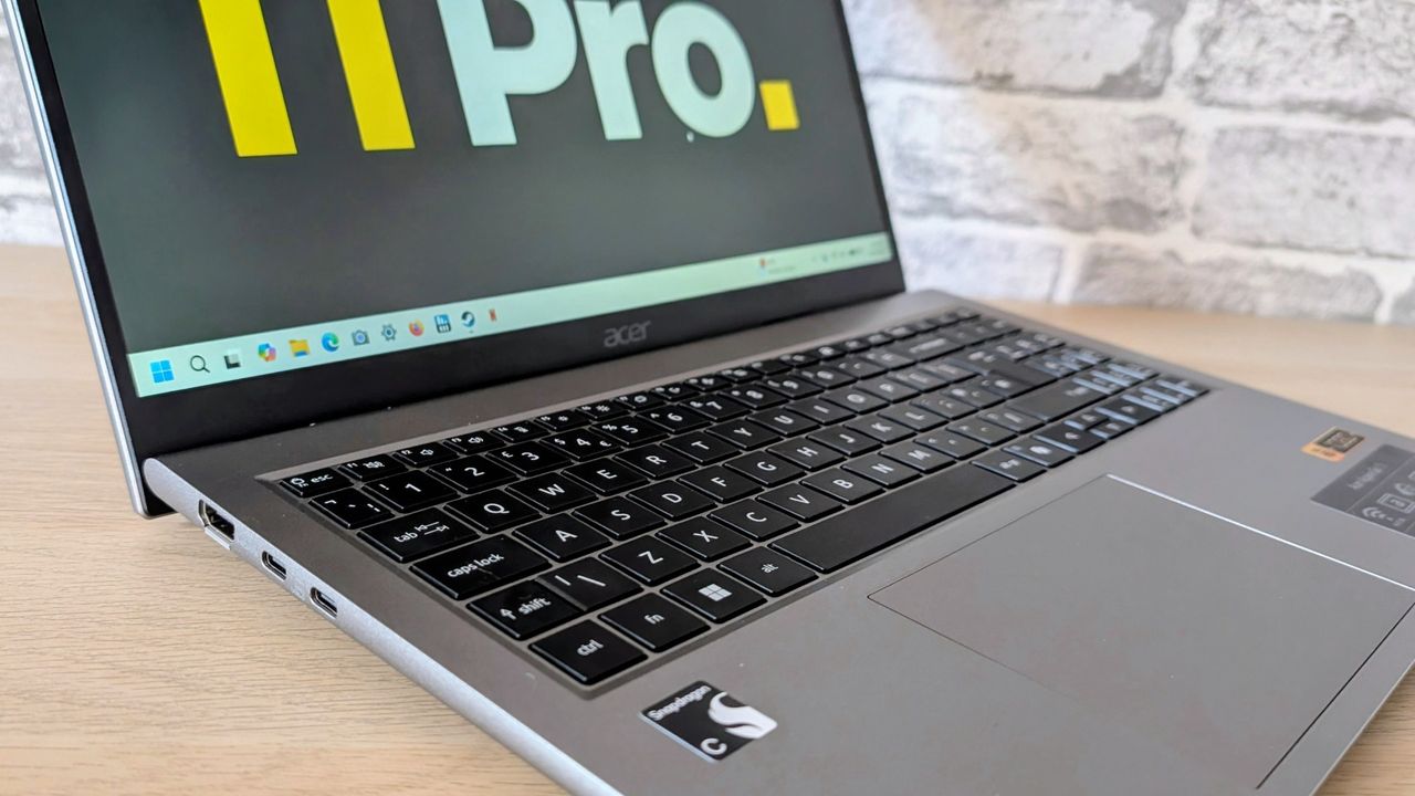 The Acer Aspire Go on the ITPro background
