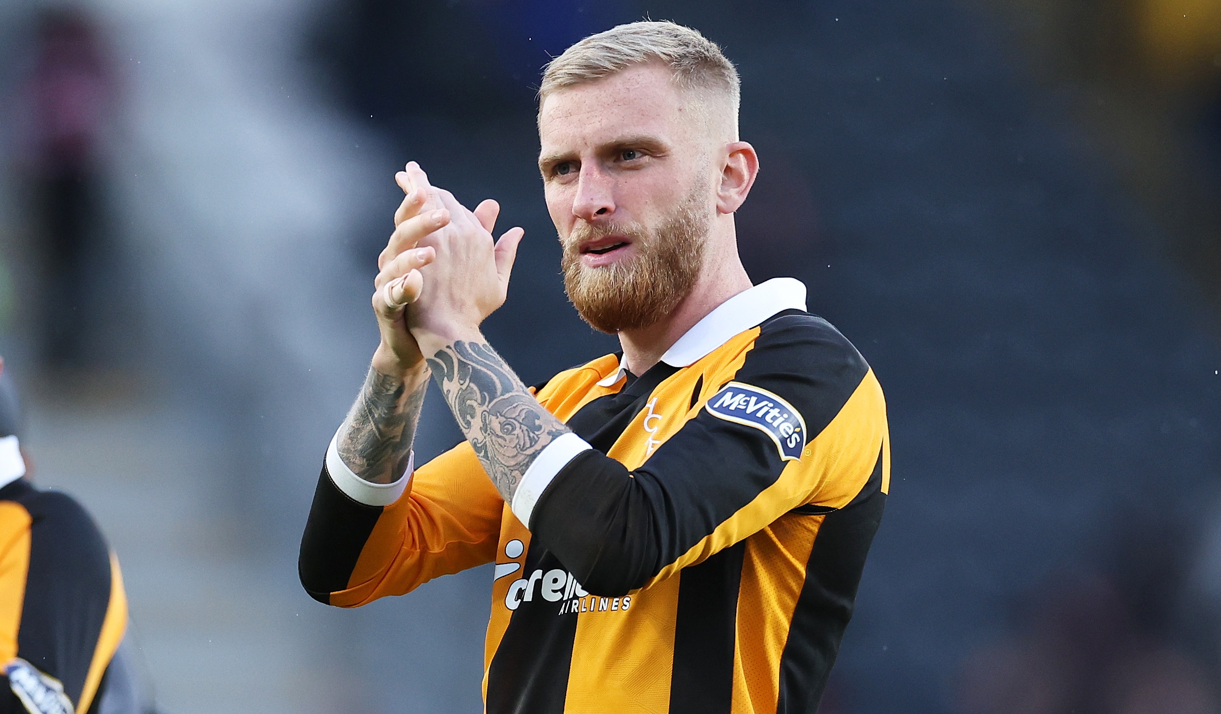 Oliver McBurnie of Hull City applauds the fans after the Premier League 2026/27 match between Hull City and Brentford at MKM Stadium on October 25, 2026 in Hull, England