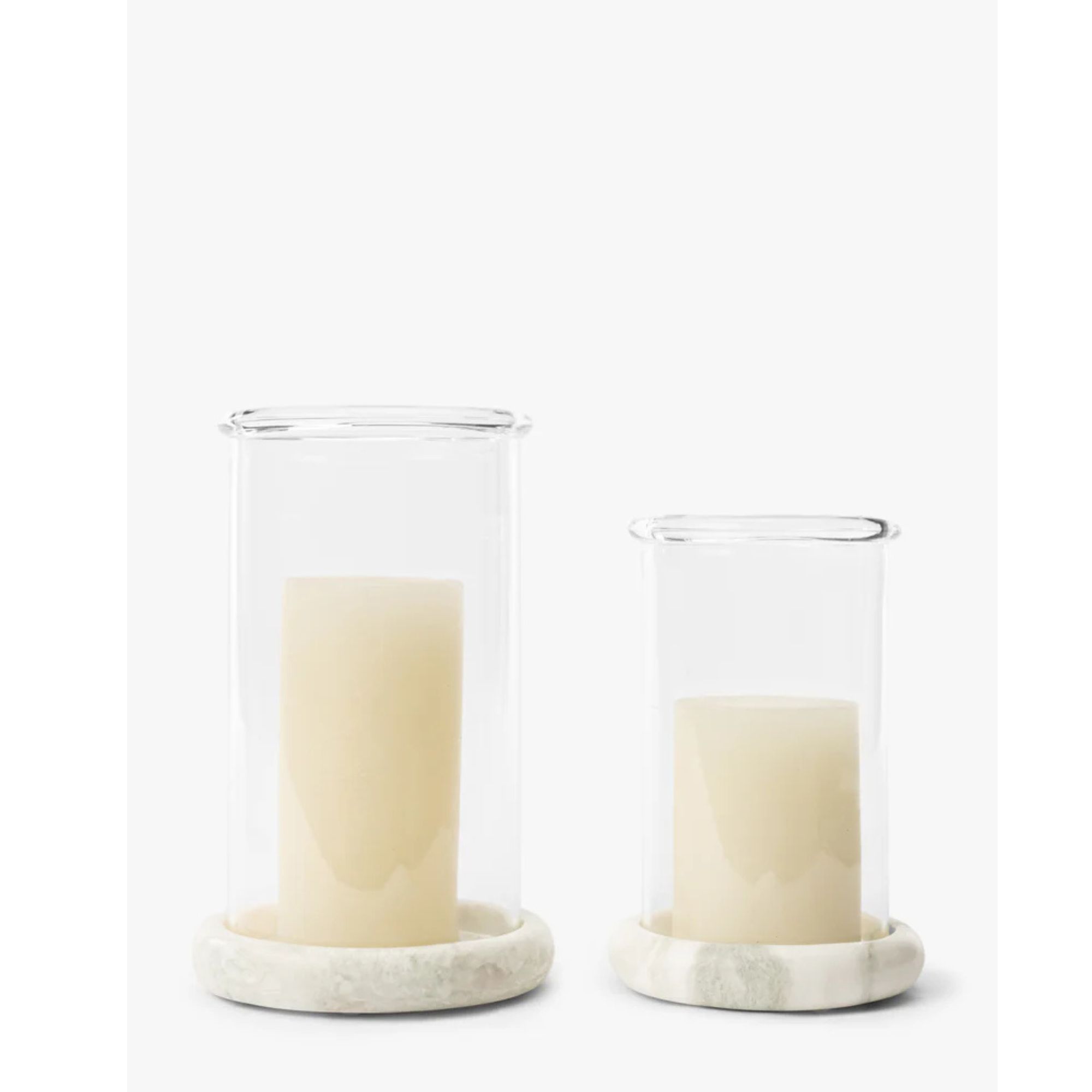 glass and stone hurricane lanterns with candles
