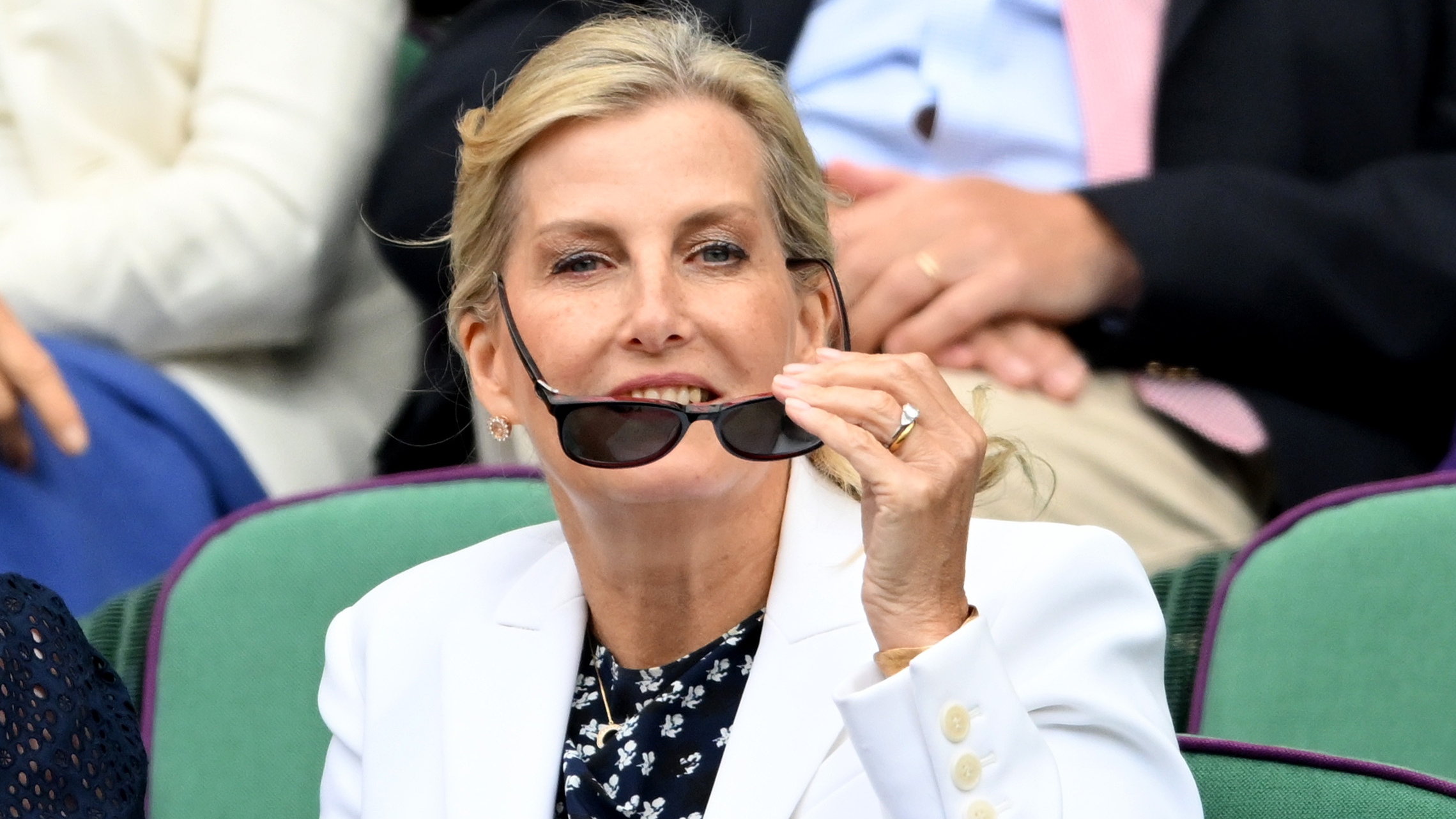 Sophie, Duchess of Edinburgh puts on her sunglasses on day eight of the Wimbledon Tennis Championships