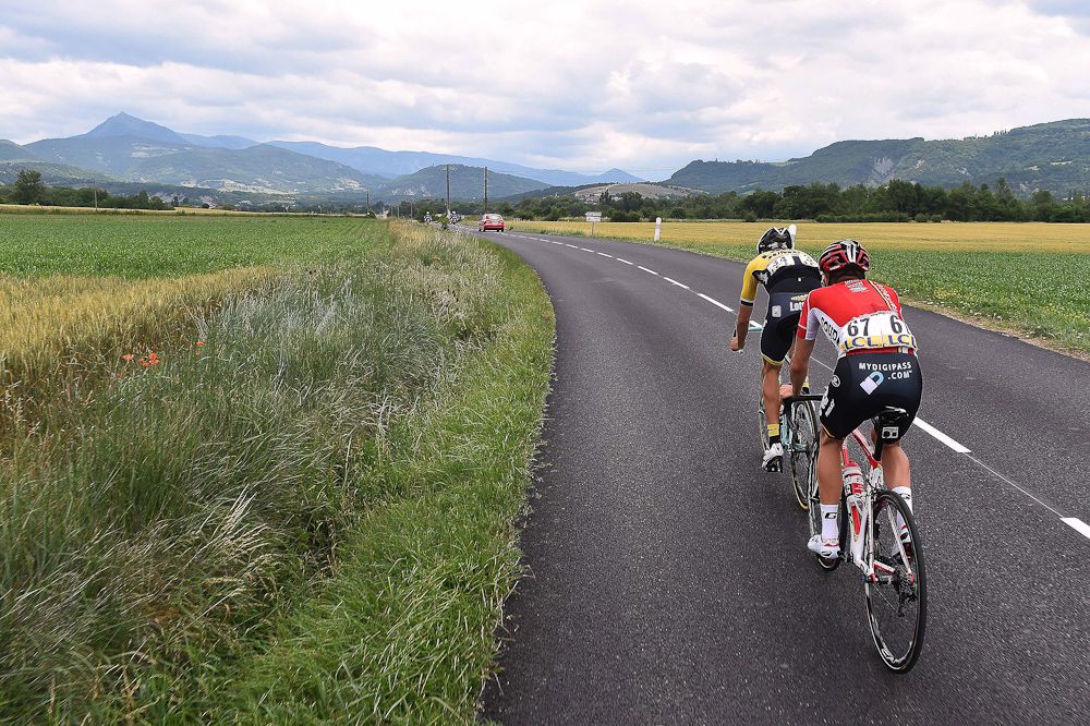 Escapees Martijn Keizer (LottoNL-Jumbo) and Tosh Van der Sande (Lotto-Soudal).