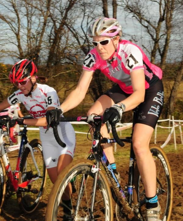Kari Studley (Velo Bella) having no trouble on a muddy uphill.