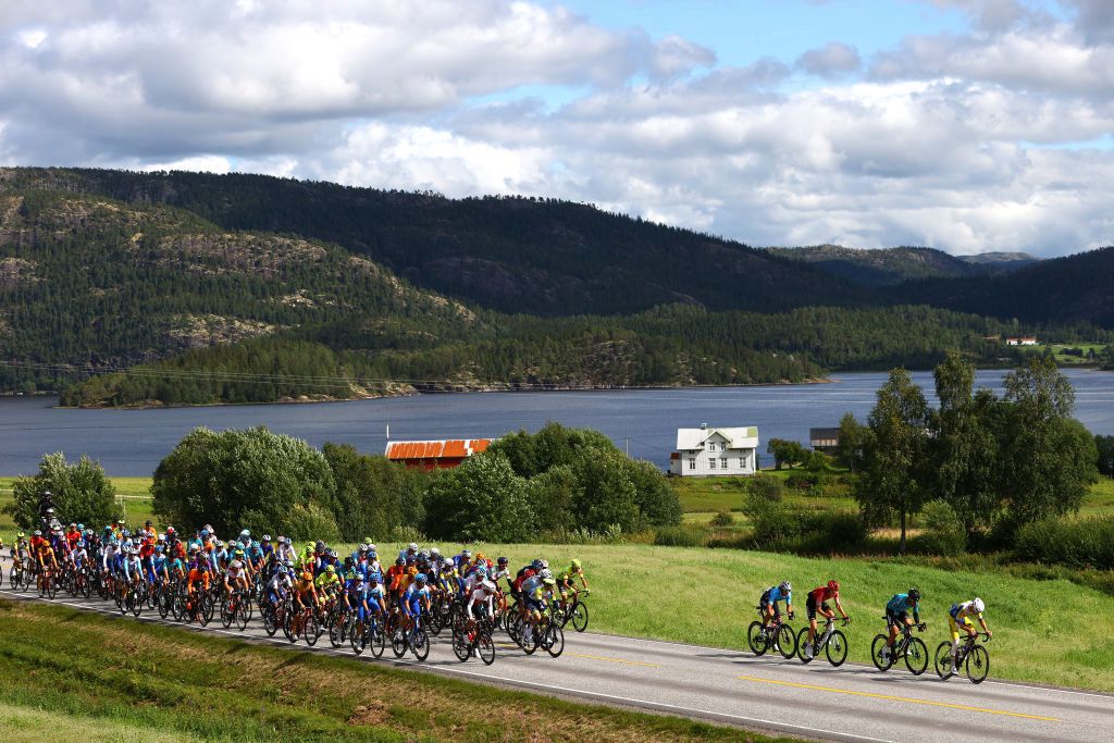 SKALLSTUGGU NORWAY AUGUST 13 A general view of the peloton competing passing through the Klinga area during the 9th Arctic Race Of Norway 2022 Stage 3 a 1777km stage from Namsos to Skallstuggu 474m ArcticRace on August 13 2022 in Skallstuggu Norway Photo by Michael SteeleGetty Images