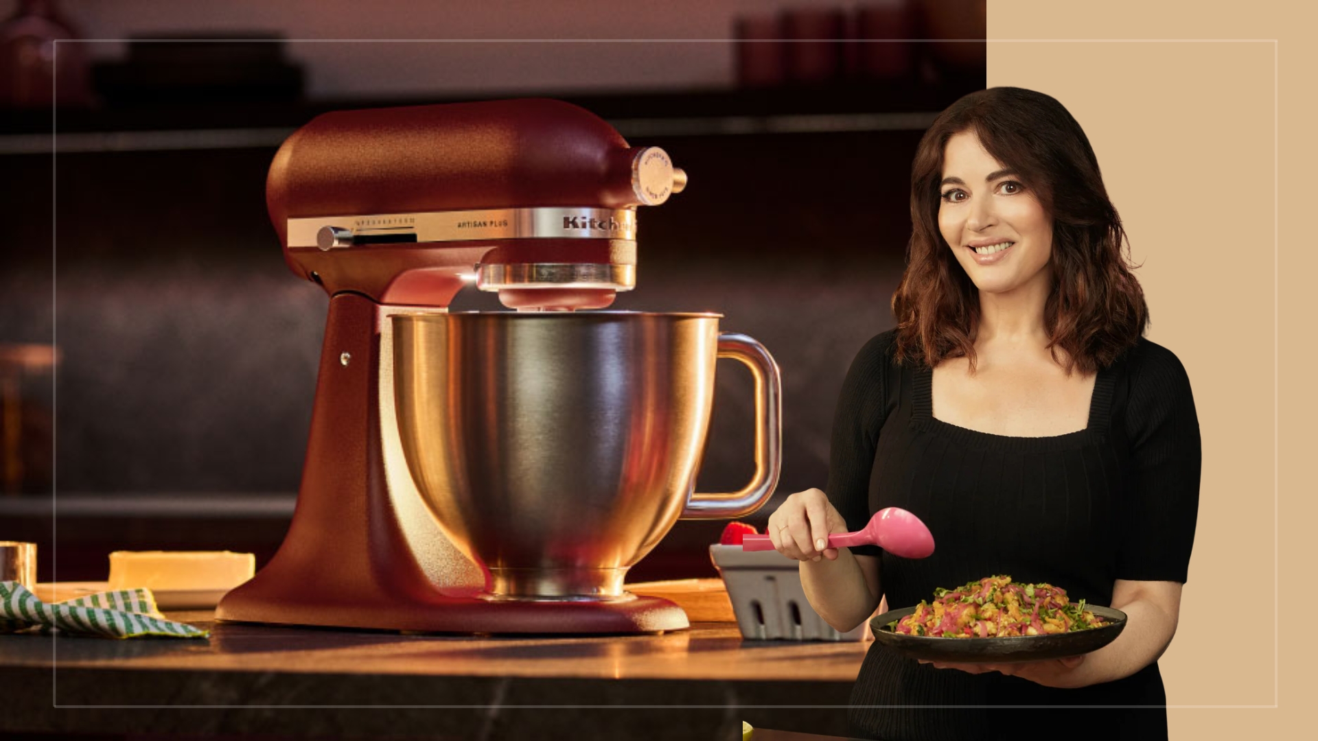 Nigella Lawson cutout next to a copper KitchenAid on a counter