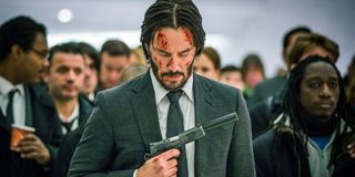 John Wick: Chapter 2 John walking through The Oculus, with his face cut and bleeding