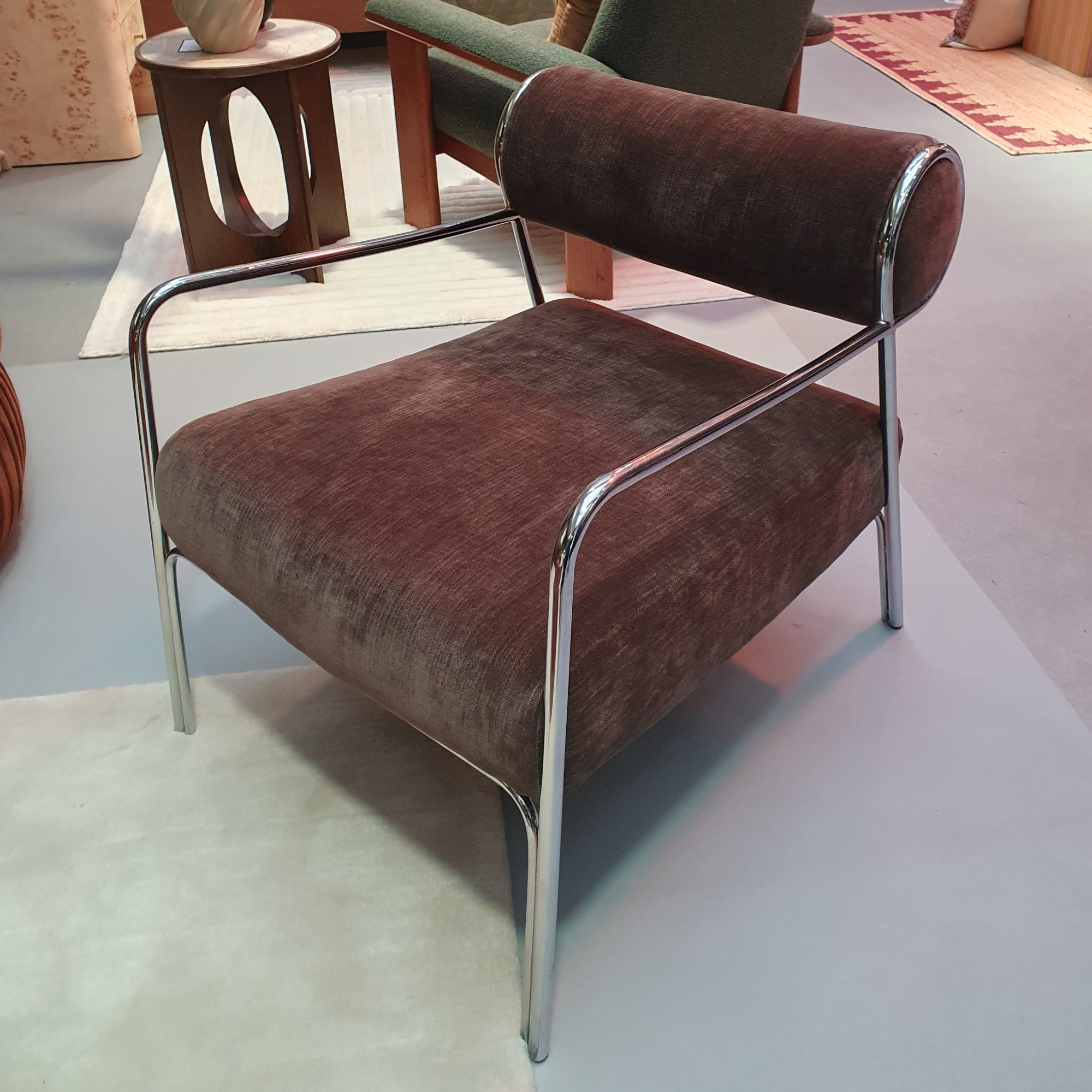 The John Lewis Curve accent chair in cocoa at the autumn/winter press preview