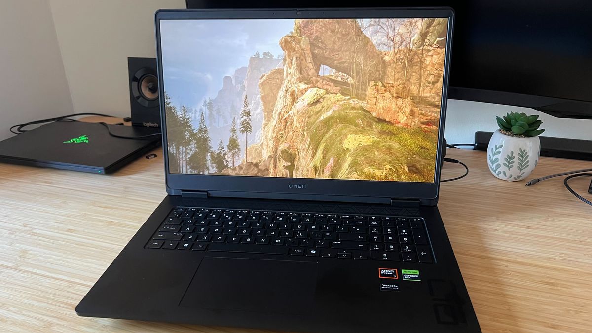 HP Omen 17 gaming laptop running The Talos Principle 2 on a wooden desk