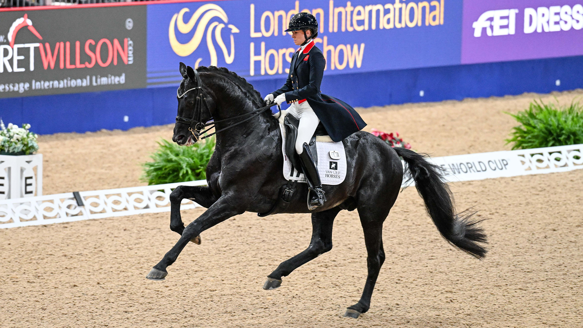 Lottie Fry riding Glamourdale in extended canter at London International