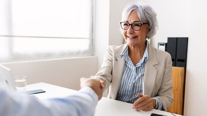 An older businesswoman at a job interview.