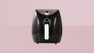 Tower T17021 Family Size Air Fryer on pink background
