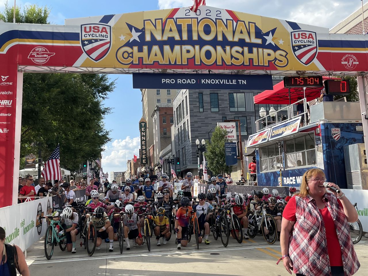 Riders kneel at the US Pro Criterium Championships