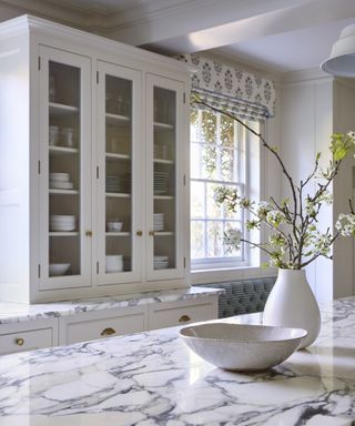 Marble counter top, white cabinet