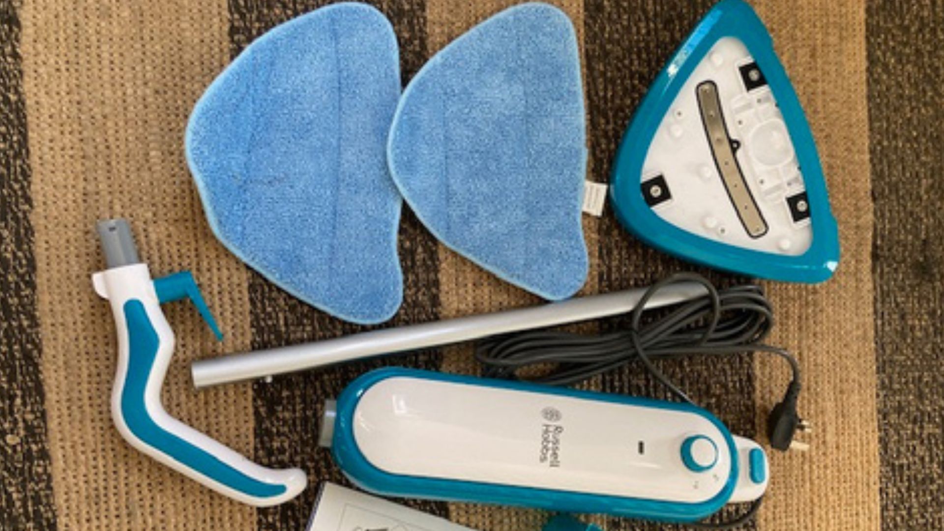 Testing the Russell Hobbs Steam and Clean Lightweight Steam Mop in Linda's home