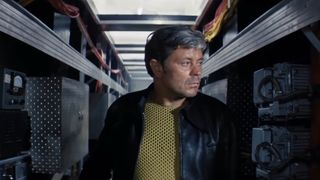 A man walks around in a space ship in Solaris
