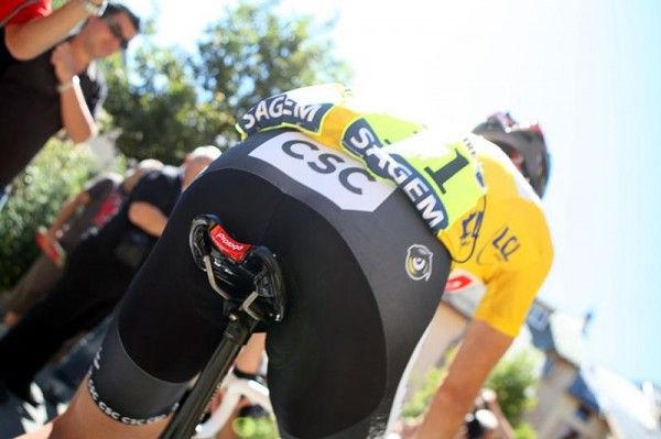 Carlos Sastre has the yellow jersey while his CSC-Saxo Bank squad wear the yellow numbers of best team.