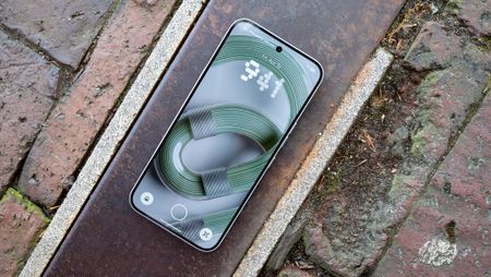 A green wallpaper on the Nothing Phone 4a Pro's lockscreen