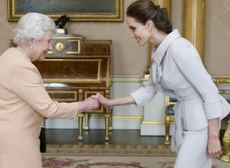 Angelina Jolie receives honorary damehood from Queen of England
