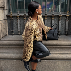 Scandi and French influencers @nnennaechem and @lenafarl wear leopard print jackets with black outfits