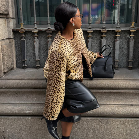 Scandi and French influencers @nnennaechem and @lenafarl wear leopard print jackets with black outfits