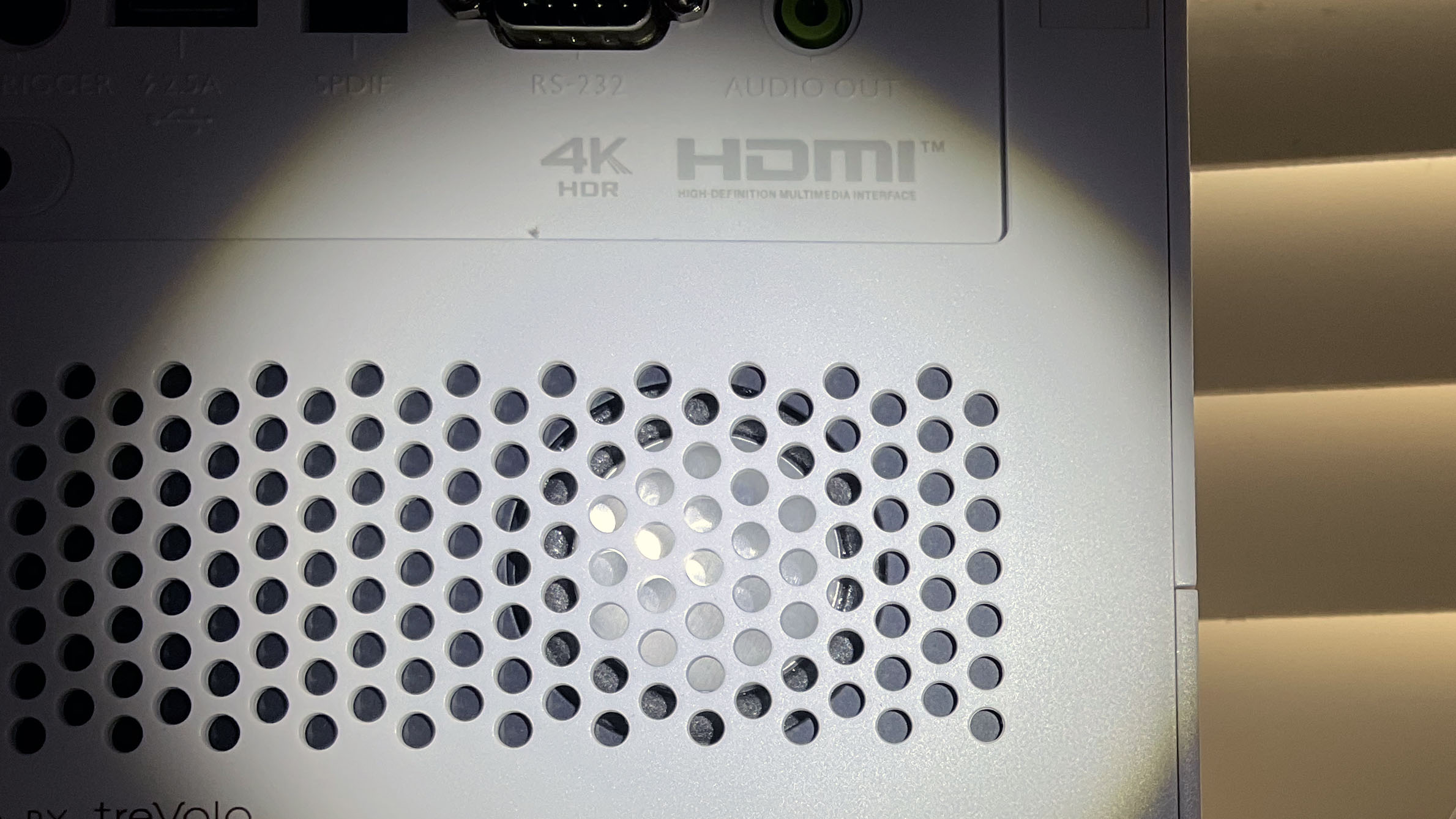 One of the rear-facing speakers in the BenQ X3000i gaming projector.